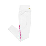 High-waisted leggings with side pockets, made from recycled polyester and elastane, featuring a flattering cut and UPF 50+ protection.