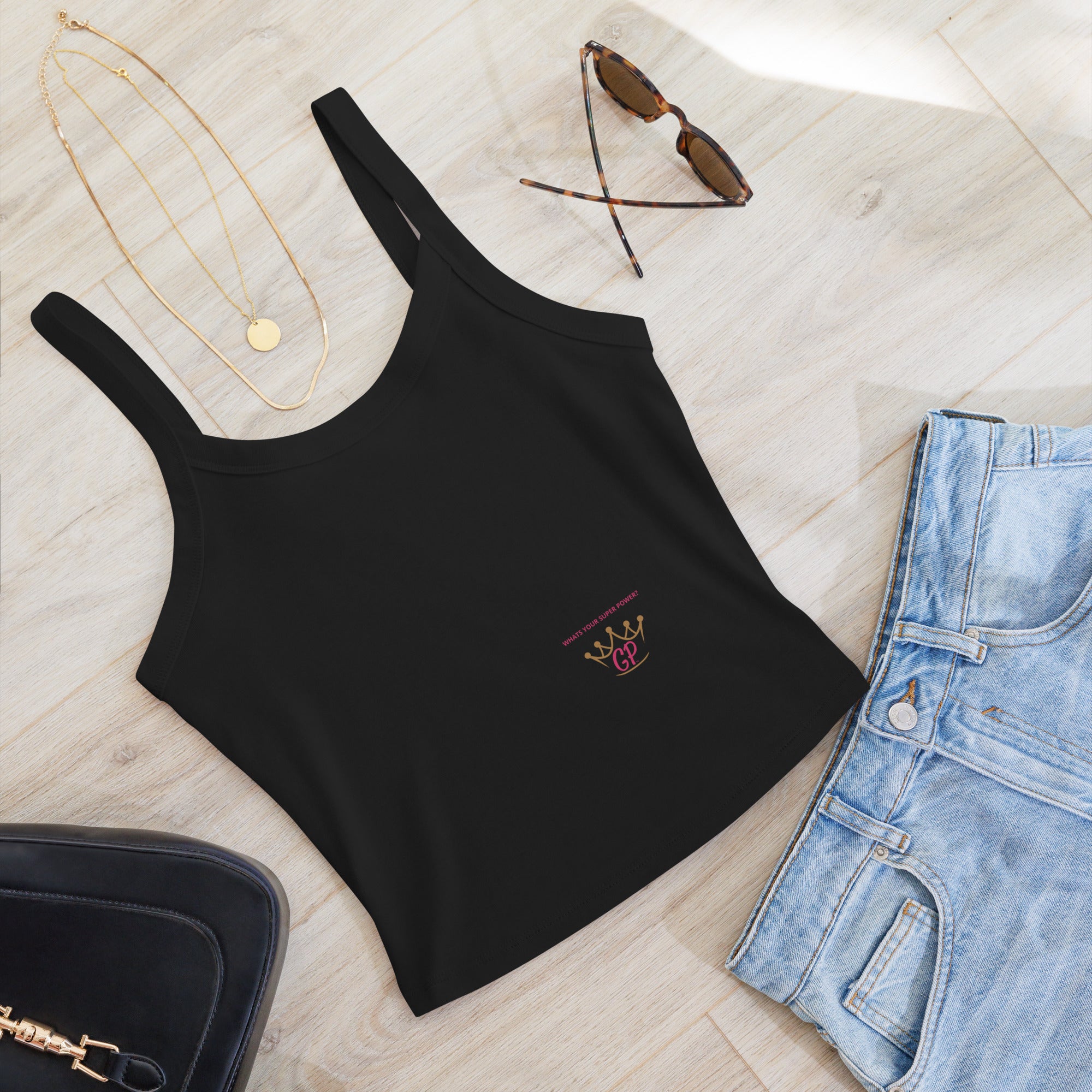 Women’s micro-rib tank top made from soft Airlume cotton, featuring thick straps, a scoop neck, and a mid-length cut.

